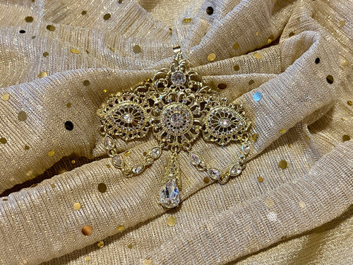 Broche doré